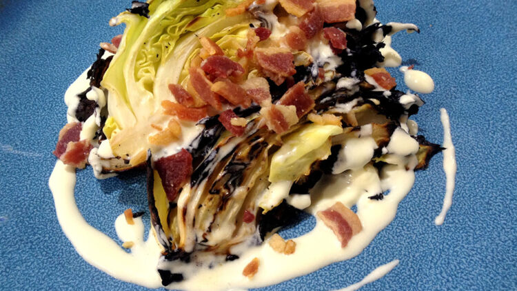 Blackened Hispi cabbage with aged parmesan and baco