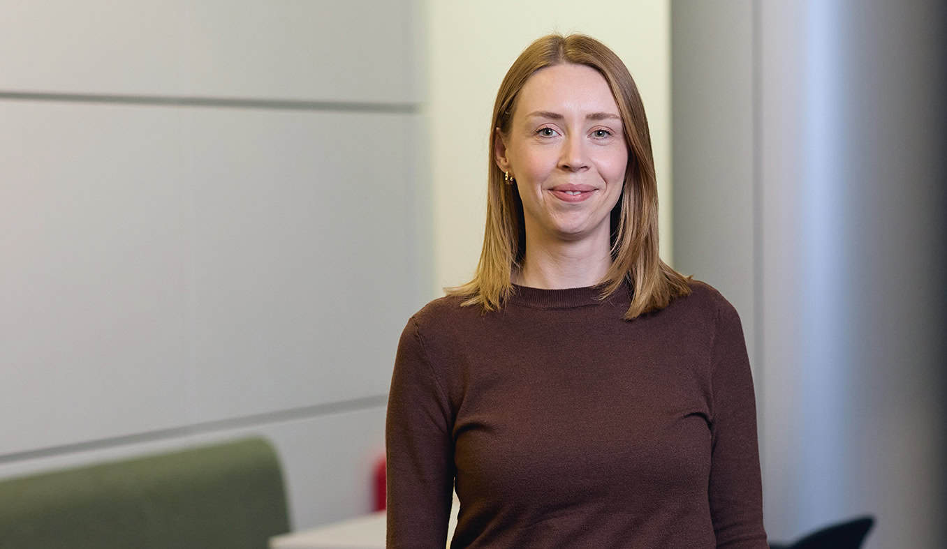 Rhiannon Read smiling in a professional setting, representing BM Caterers' commitment to quality and.